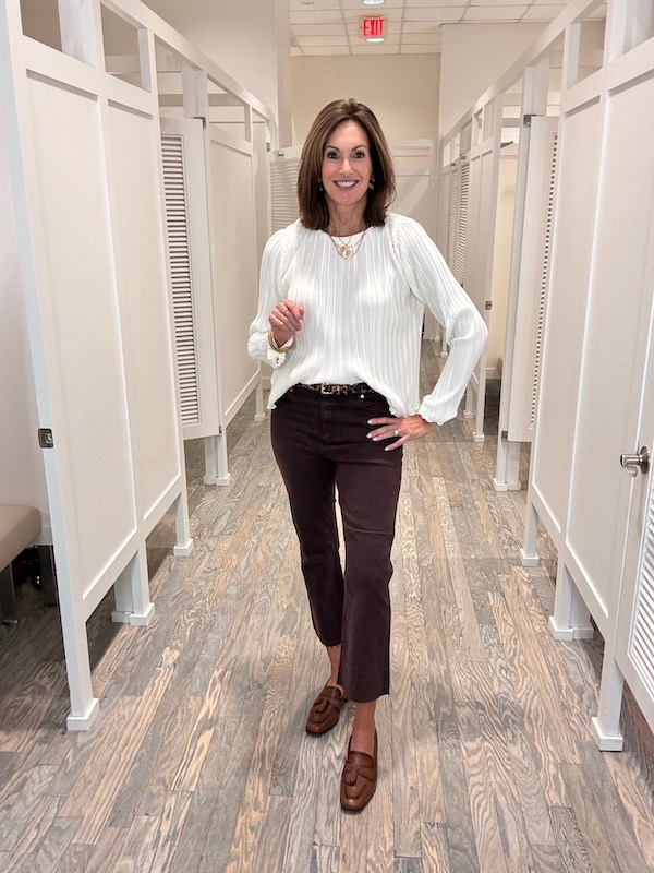 dressy top and brown jeans